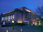 Sheffield City Hall, a Neo-classical design with a large portico and prominent pillars which were damaged when a bomb fell on the ajoining Barkers Pool during World War II. It is a grade II* listed building