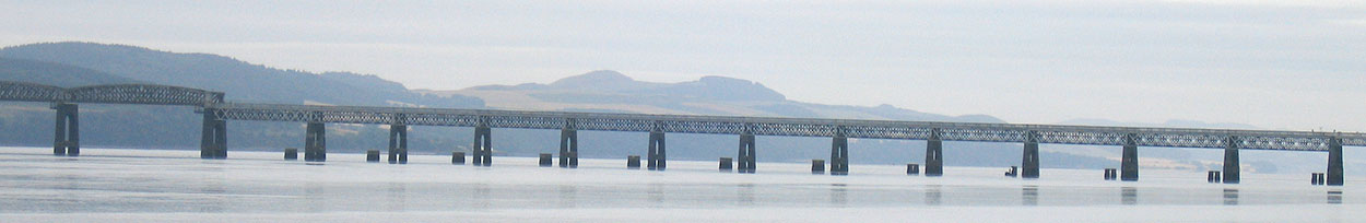 Northern segment of the second Tay Bridge, showing stumps of the original bridge's piers poking above the Tay