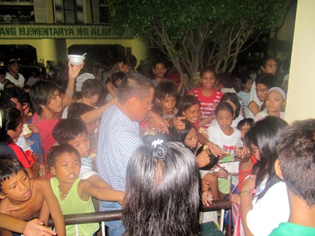 Distribution of Relief packets to flood victims-EP Manila