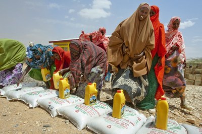 Women collect food at the SOS Children distribution centre in Gode