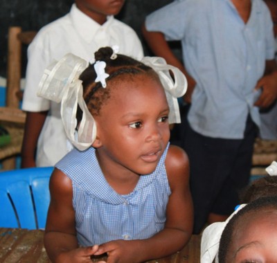 Profile of a little girl with ribbons at SOS Community Centre Santo