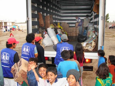 Food and goods being distributed at guadalupe, Peru following earthquake 2008 ERP