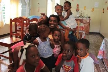 Mothers and children in the SOS CV Santo, Haiti, at Christmas