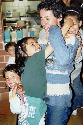 Street Children in Social Centre Nueva Vida centre director covered by grateful street children