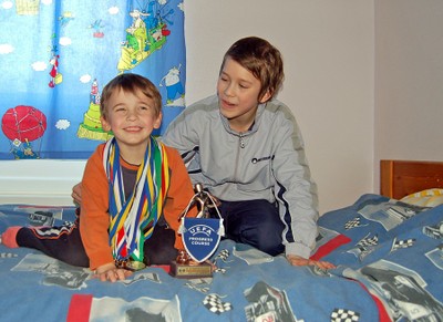 Boy with football medals, Estonia